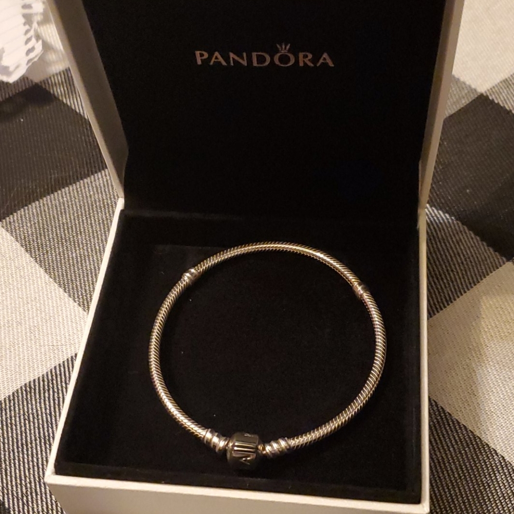 Pandora 6" bracelet with "pandora" engraved in it